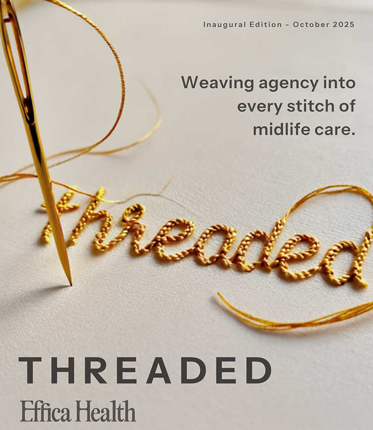 Smiling woman on laptop in a cozy kitchen