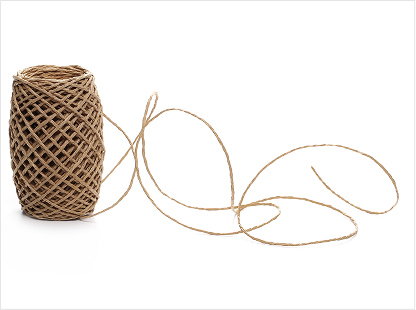 Smiling woman on laptop in a cozy kitchen